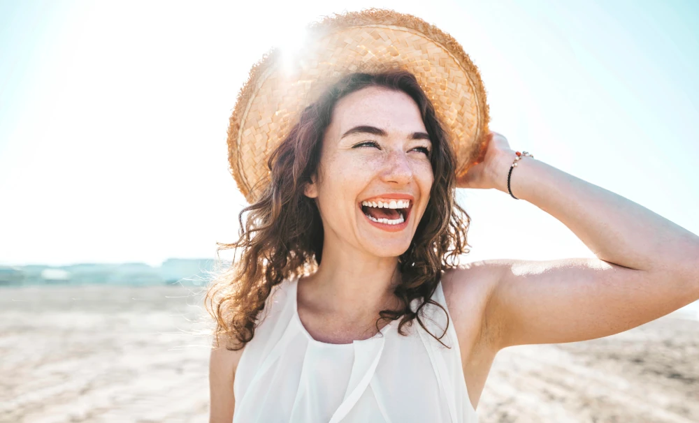 happy beautiful woman on beach